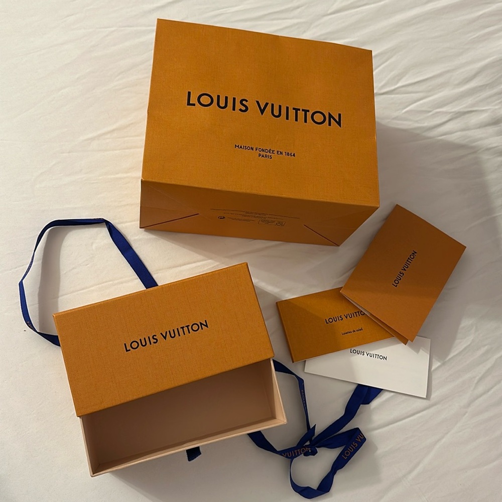 Louis Vuitton box and shopping bag